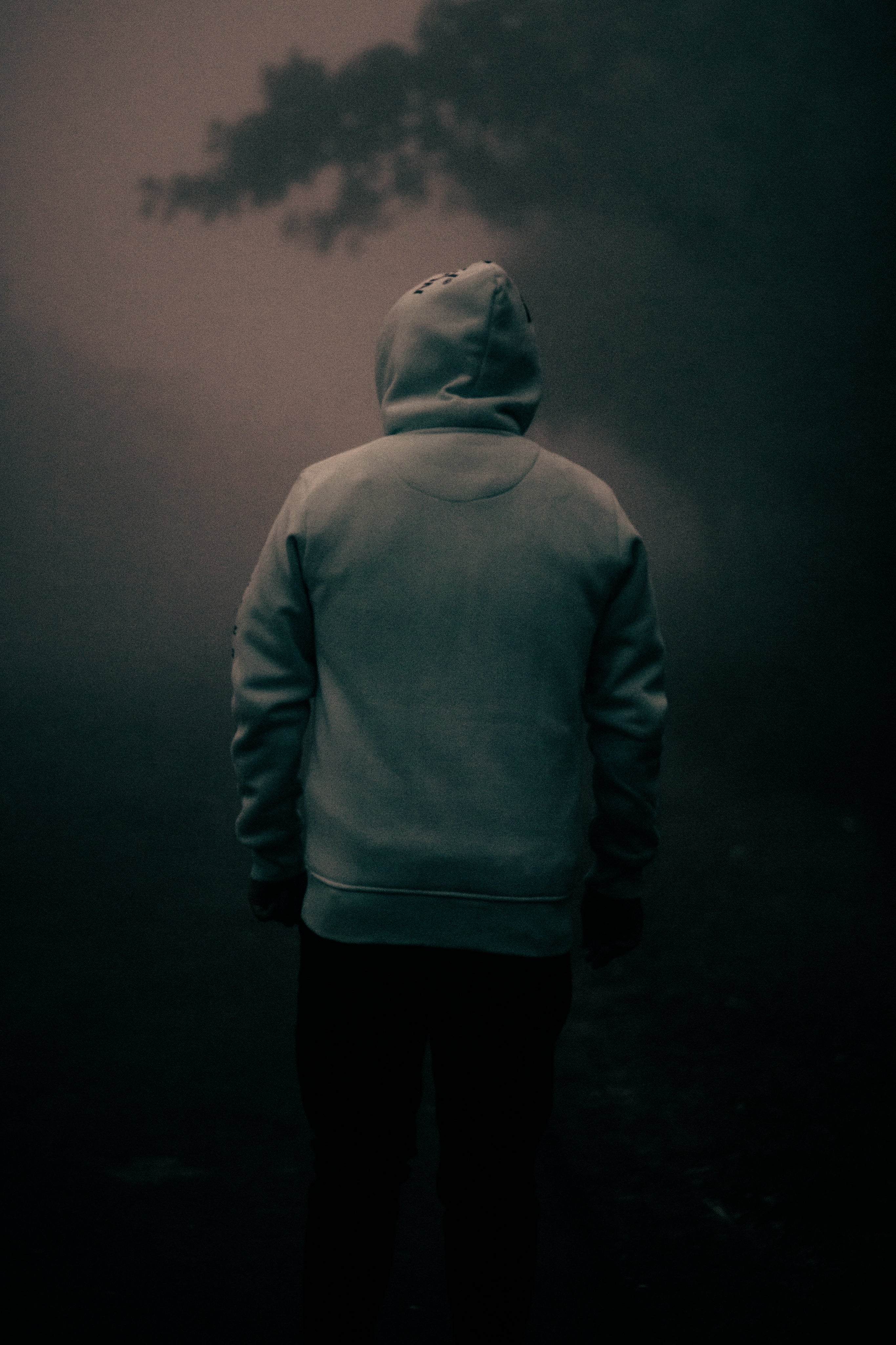 moody-image-of-a-person-in-grey-hooded-sweater.jpg